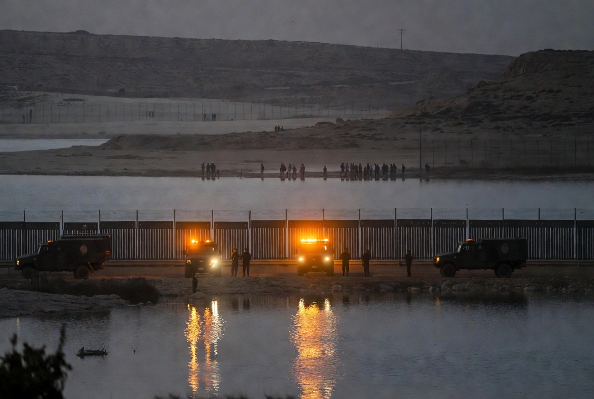 Spanish military reinforcing Ceuta border at night